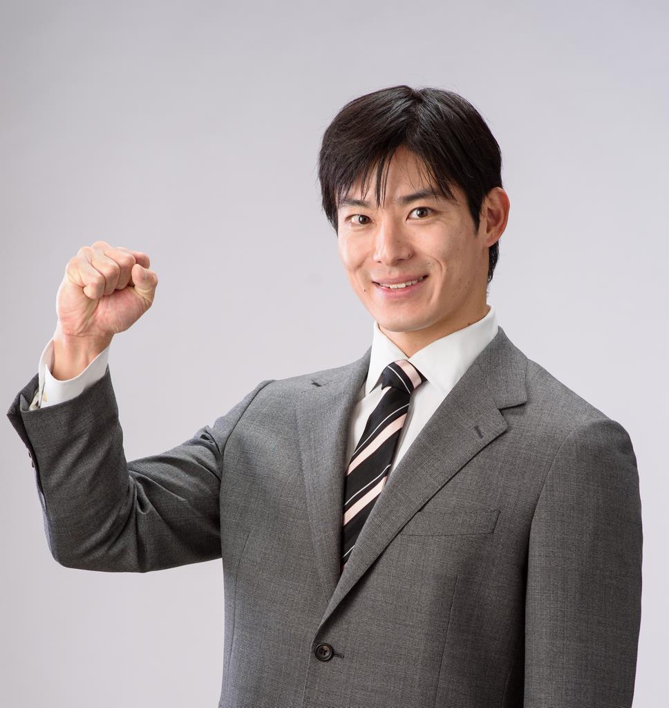 ガッツポーズをしている石田知事の画像